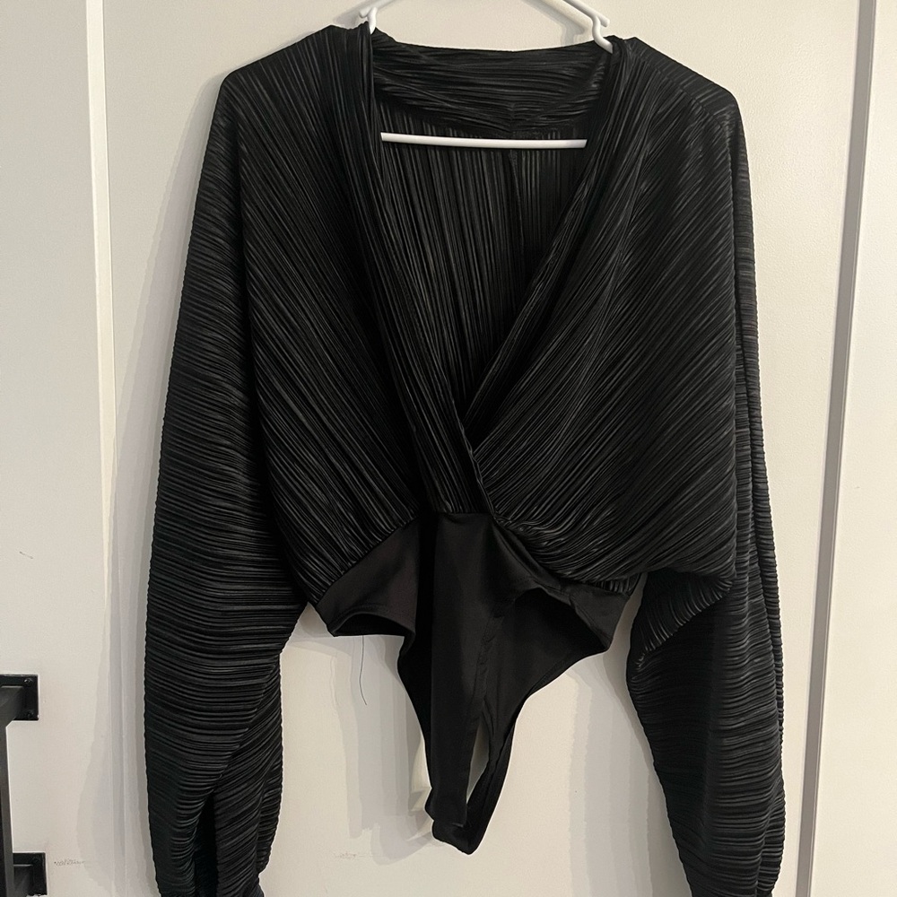 Silk sleeved low cut body suit with sleeve details